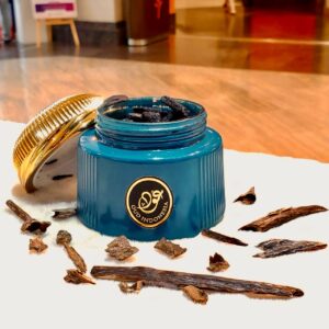 Blue box with gold lid of bakoor / incence - tradtional wooden chips with perfume oil